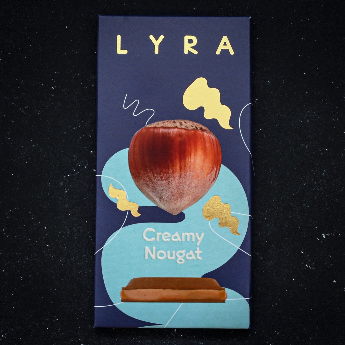 Creamy Nougat- Biela čokoláda s lieskovo-orieškovou náplňou 80g